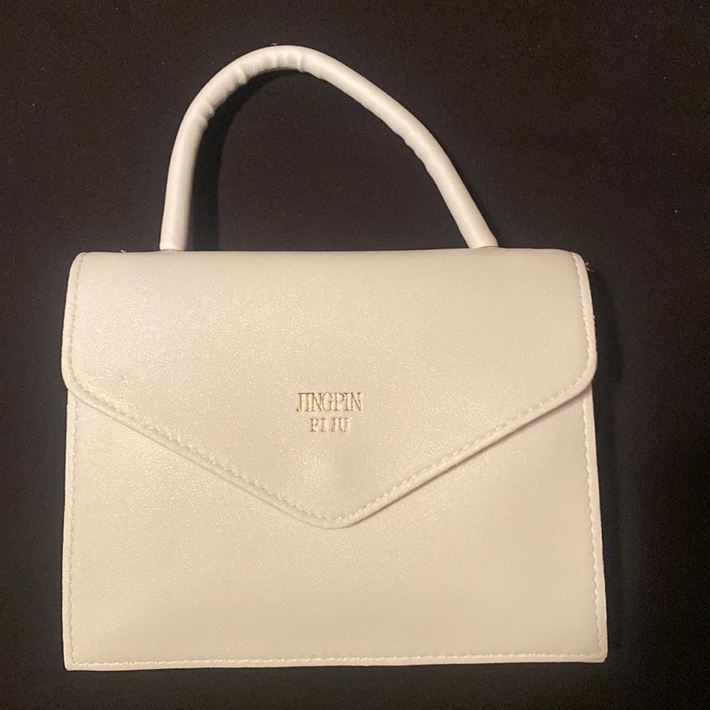 White hand purse